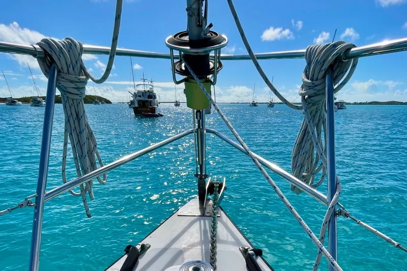Slide: The Image of Deck of 1986 Gulfstar Hirsch 45 sailboat with blue covers and safety equipment. - 11