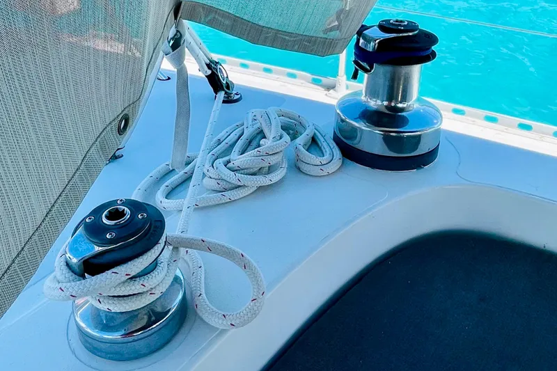 Slide: The Image of 1986 Gulfstar Hirsch 45 sailboat deck with winches and covered helm, docked at marina. - 14