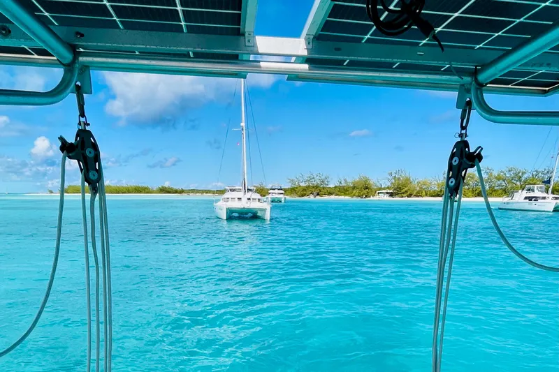 Slide: The Image of Sailboat view from Gulfstar HIRSCH 1986, turquoise waters, clear sky, tropical island. - 18