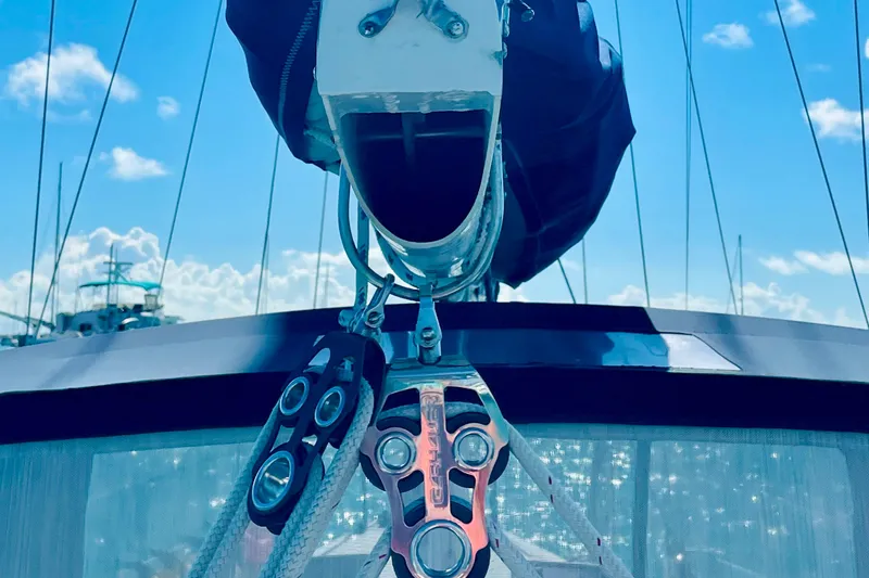 Slide: The Image of Sailboat rigging on 1986 Gulfstar HIRSCH under clear blue sky. - 30