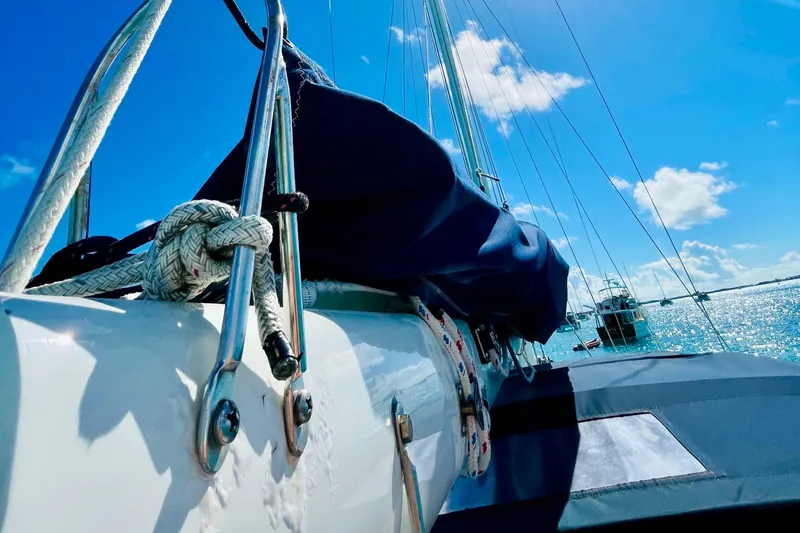 Slide: The Image of Sailboat deck view, Gulfstar HIRSCH 1986, under clear blue sky and ocean. - 32
