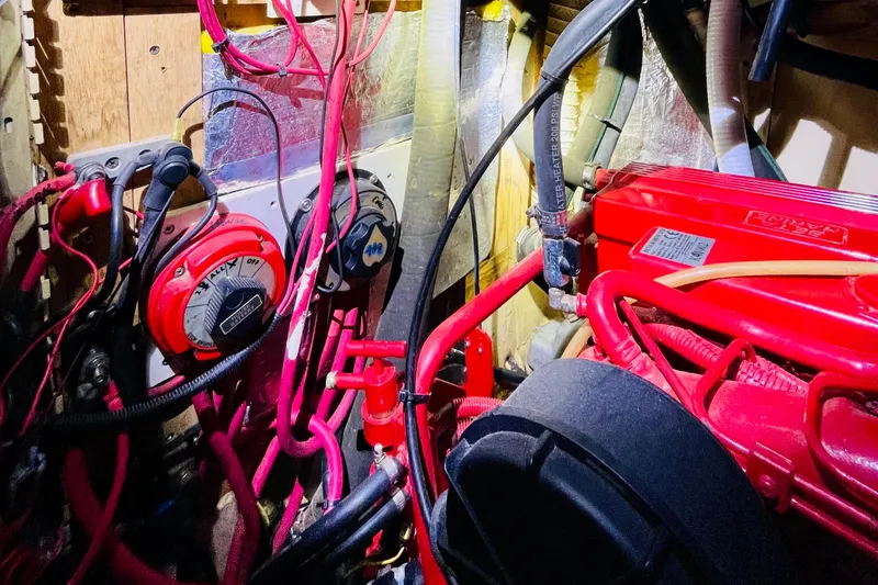 Slide: The Image of Engine room of 1986 Gulfstar HIRSCH with red wiring and components. - 54