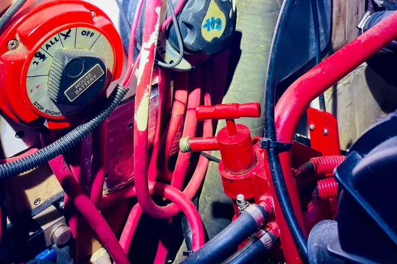 Slide: The Image of Engine compartment of a 1986 Gulfstar HIRSCH with red battery switch and cables. - 60