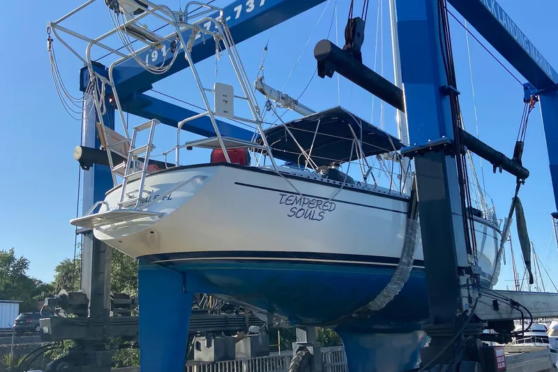 Slide: The Image of 1986 Gulfstar Hirsch 45 sailboat "Tempered Souls" on a lift at a marina. - 70