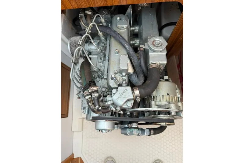 Slide: The Image of Engine of a 2004 Catalina 36 MkII sailboat, showcasing mechanical components. - 29