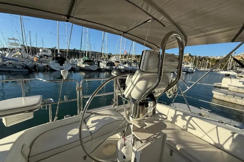 Slide: The Image of Cockpit view of 2004 Catalina 36 MkII sailboat docked in a marina. - 33