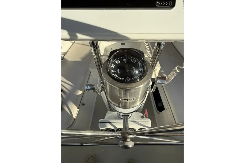 Slide: The Image of Compass and steering wheel of a 2004 Catalina 36 MkII sailboat. - 41