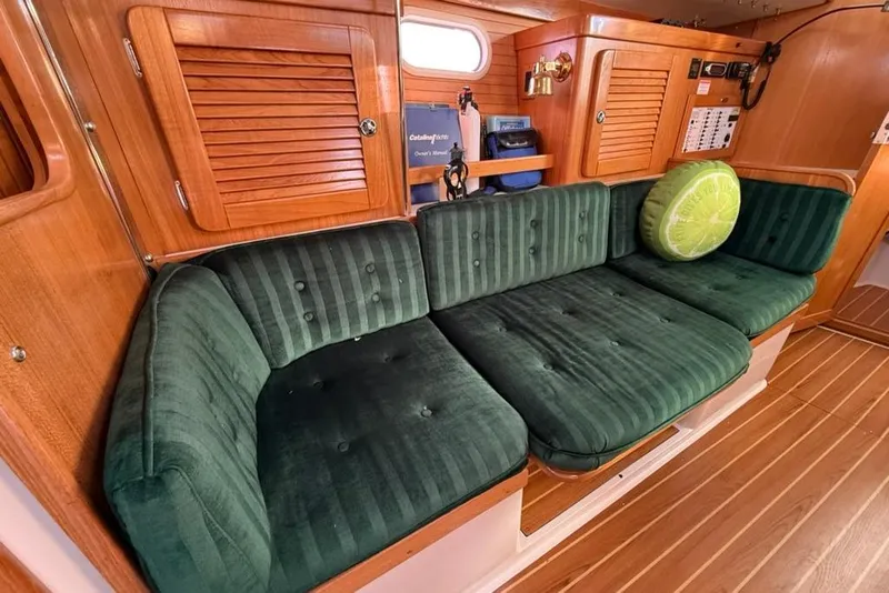 Slide: The Image of Luxurious interior of 2004 Catalina 36 MkII sailboat with green velvet seating. - 8