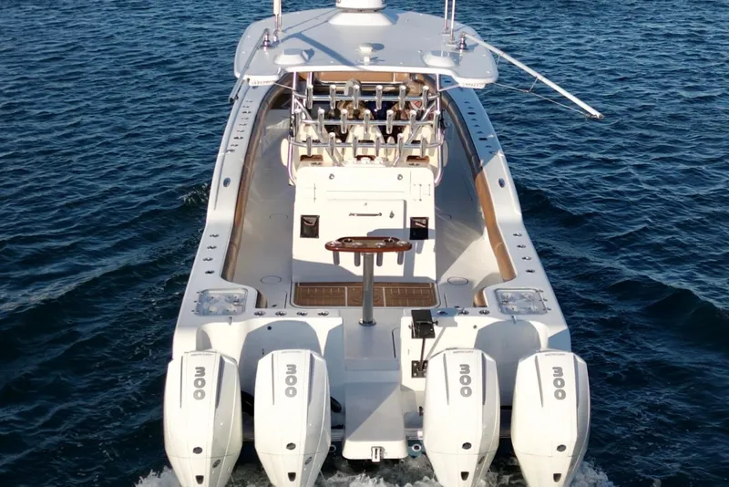 Slide: The Image of 2022 Tideline 365 Offshore boat with four powerful engines on open water. - 1