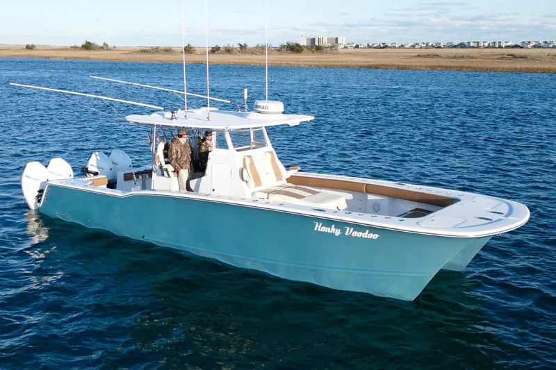 Slide: The Image of 2022 Tideline 365 Offshore boat cruising on open water. - 12