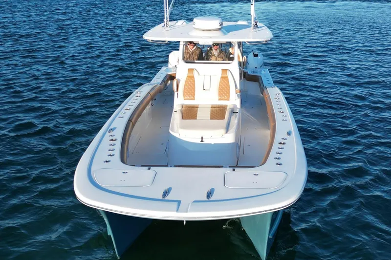 Slide: The Image of 2022 Tideline 365 Offshore boat cruising on open water. - 13