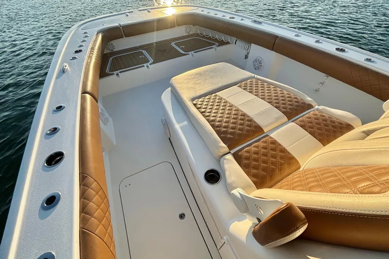 Slide: The Image of Luxurious interior of 2022 Tideline 365 Offshore boat with quilted seating. - 17