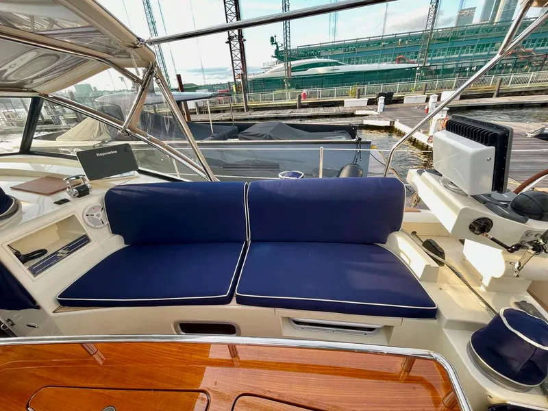 Slide: The Image of Interior of a 2010 Southerly 57 RS yacht with blue cushions. - 11