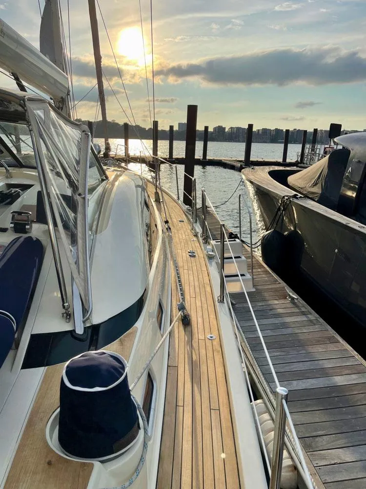 Slide: The Image of 2010 Southerly 57 RS sailboat docked at sunset. - 23