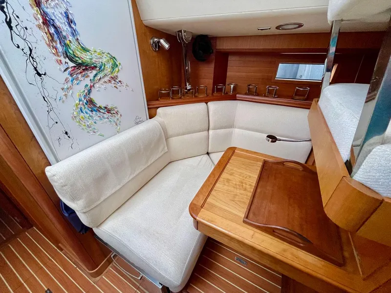 Slide: The Image of Interior of a 2010 Southerly 57 RS yacht with cozy seating area. - 36