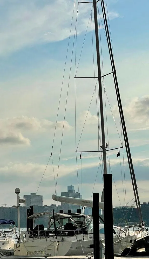 Slide: The Image of 2010 Southerly 57 RS sailboat docked at sunset. - 5