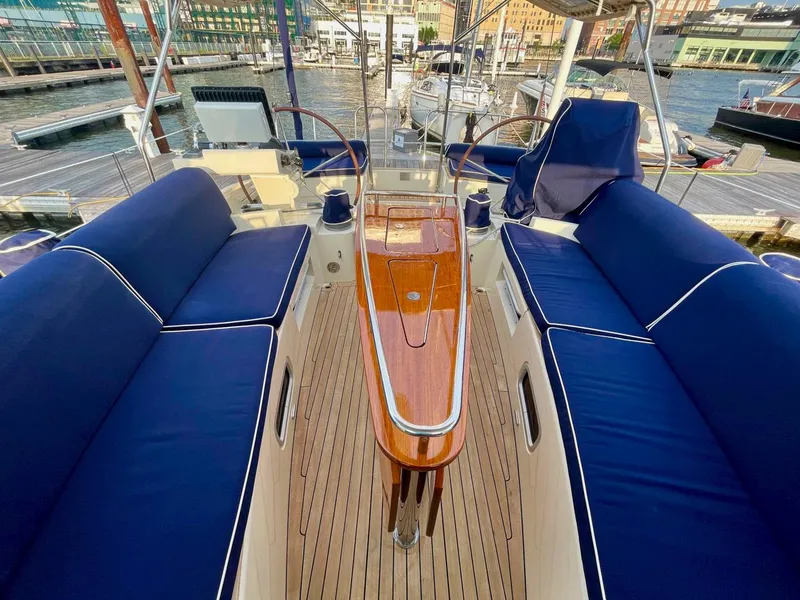 Slide: The Image of Interior of a 2010 Southerly 57 RS yacht with blue cushions. - 8