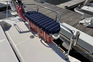 Slide: The Image of 2009 Hunter 50 Center Cockpit boat deck with seating and safety equipment. - 14