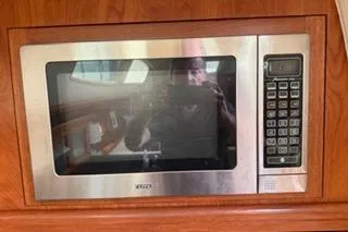 Slide: The Image of Built-in microwave in 2009 Hunter 50 Center Cockpit yacht kitchen. - 23