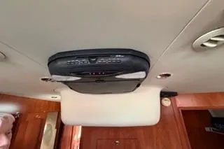 Slide: The Image of 2009 Hunter 50 Center Cockpit interior with ceiling-mounted entertainment system. - 36