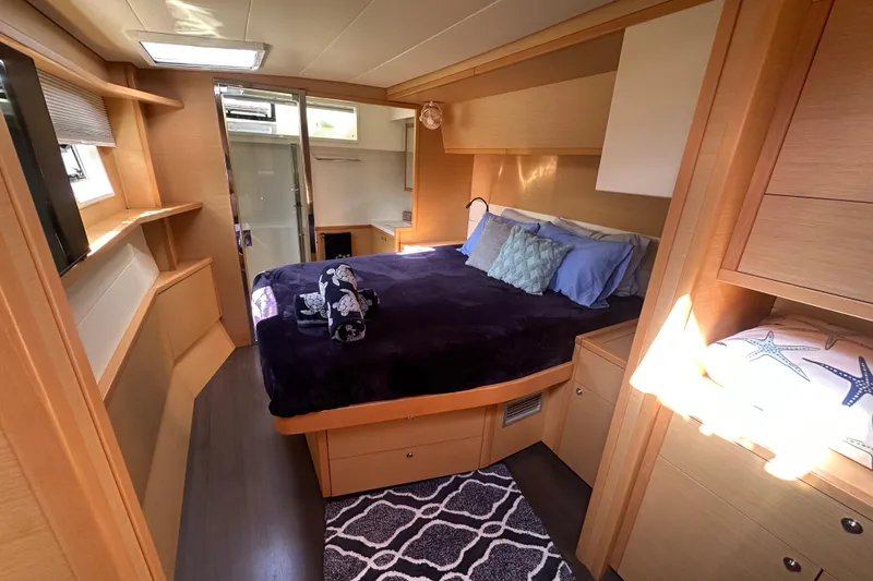 Slide: The Image of Luxurious cabin interior of 2017 Lagoon 52 F yacht with cozy bed and modern decor. - 31