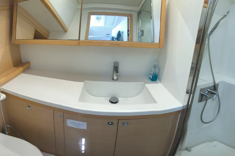 Slide: The Image of Modern bathroom interior on 2017 Lagoon 52 F yacht, featuring sink and shower. - 35