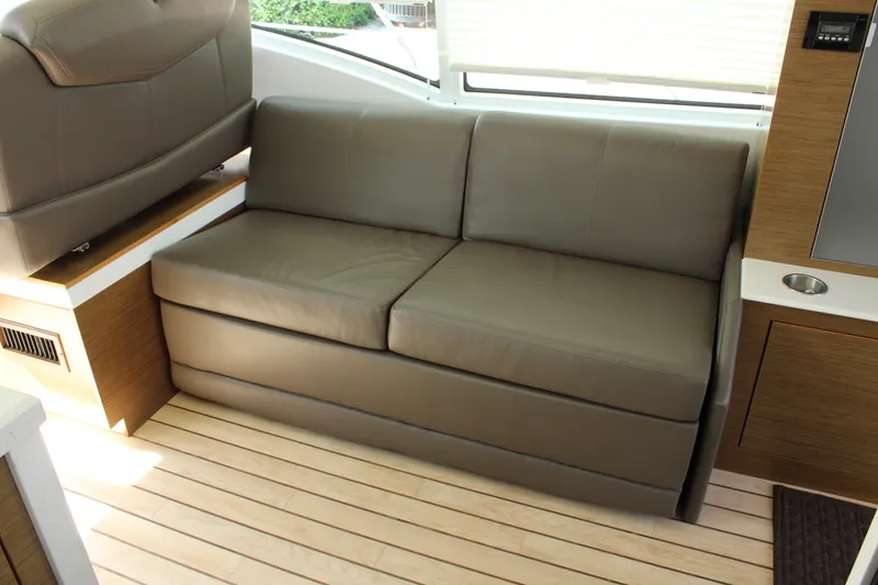 Slide: The Image of Interior of 2014 Cruisers Yachts 45 Cantius with leather sofa. - 25