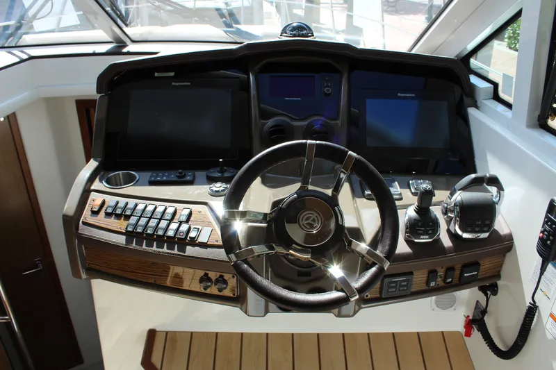 Slide: The Image of 2014 Cruisers Yachts 45 Cantius helm with modern controls. - 28