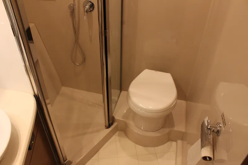 Slide: The Image of 2014 Cruisers Yachts 45 Cantius bathroom with shower and toilet. - 44