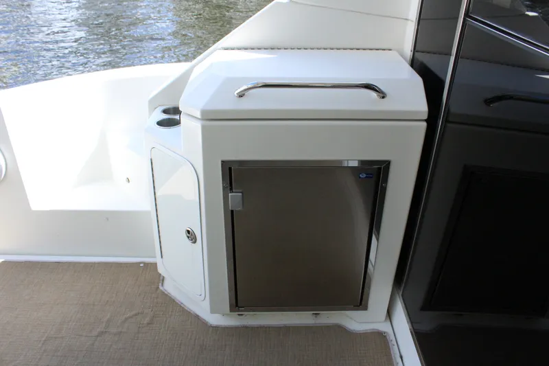 Slide: The Image of Cruisers Yachts 45 Cantius 2014 kitchen area with stainless steel fridge. - 8