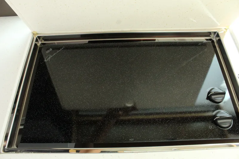Slide: The Image of Glass ceramic cooktop on a 2014 Cruisers Yachts 45 Cantius. - 23