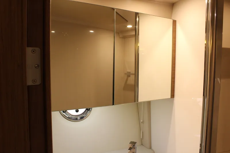 Slide: The Image of Bathroom in 2014 Cruisers Yachts 45 Cantius with mirrors. - 47