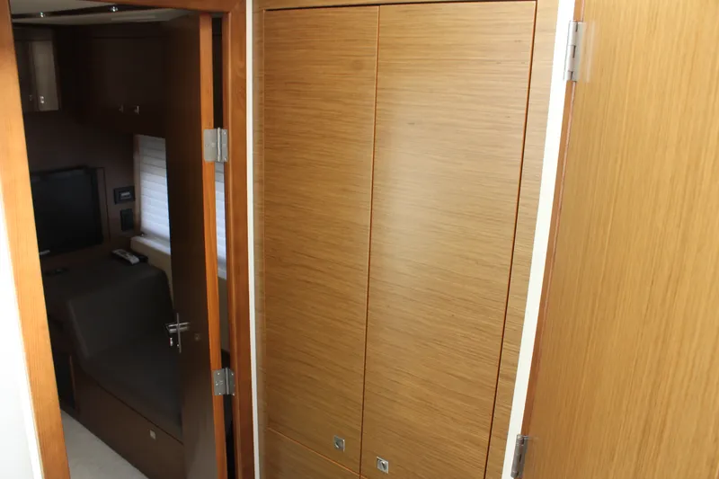 Slide: The Image of Interior of 2014 Cruisers Yachts 45 Cantius with wooden doors. - 49