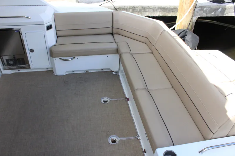 Slide: The Image of Interior of 2014 Cruisers Yachts 45 Cantius with beige seating. - 7