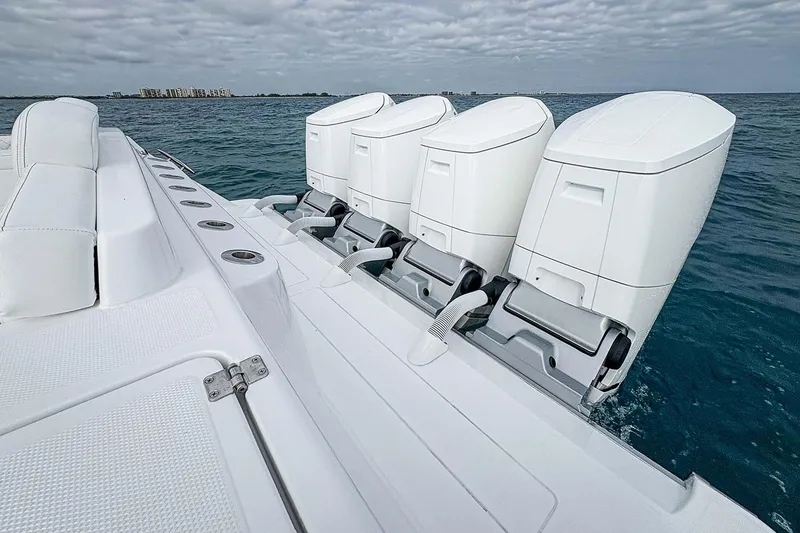 Slide: The Image of Manufacturer Provided Image: 2026 HCB 48 Campeon boat with four powerful outboard engines on open water. - 39