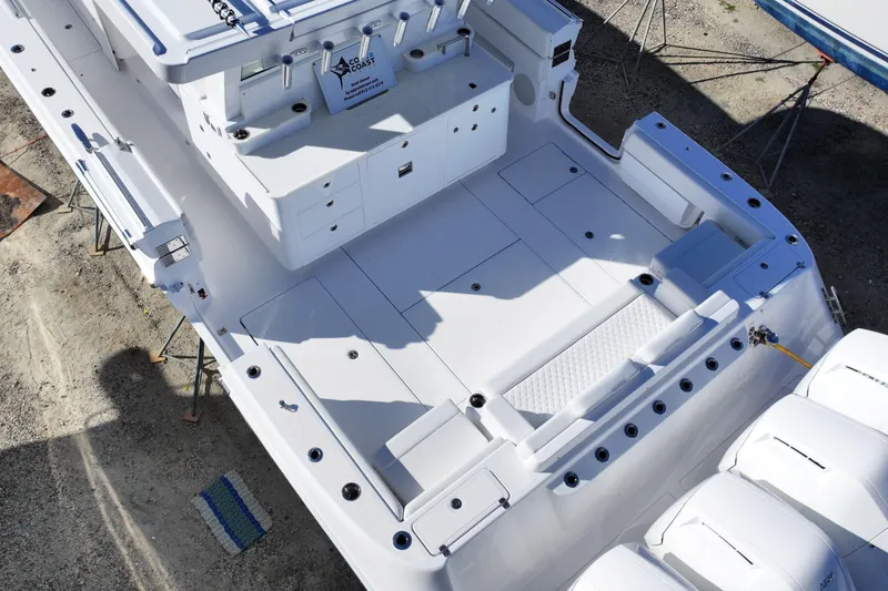 Slide: The Image of 2026 HCB 48 Campeon boat deck with seating and storage, viewed from above. - 6