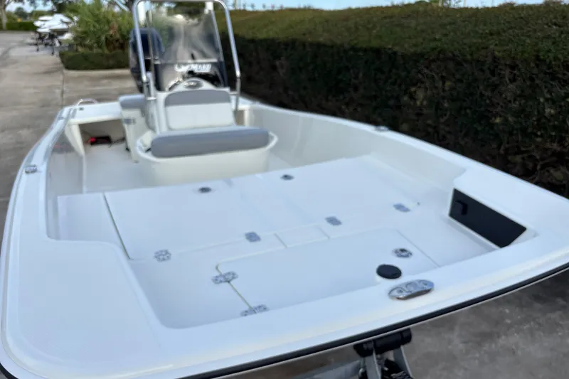 Slide: The Image of 2026 Mako Pro Skiff 15 CC boat with spacious deck and seating. - 8