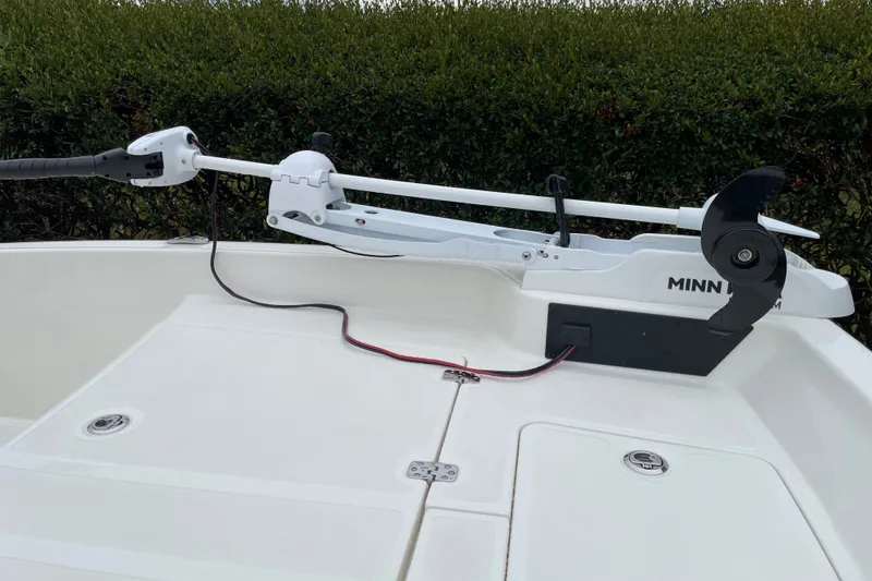 Slide: The Image of 2026 Mako Pro Skiff 15 CC with Minn Kota trolling motor on deck. - 9
