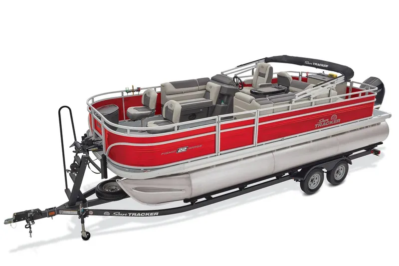 Slide: The Image of 2026 Sun Tracker Fishin' Barge 22 XP3 steering console with modern controls and seating. - 3