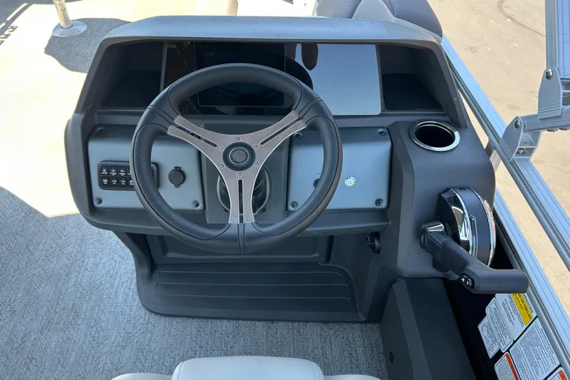Slide: The Image of Steering console of 2026 Sun Tracker Fishin' Barge 22 DLX pontoon boat. - 29