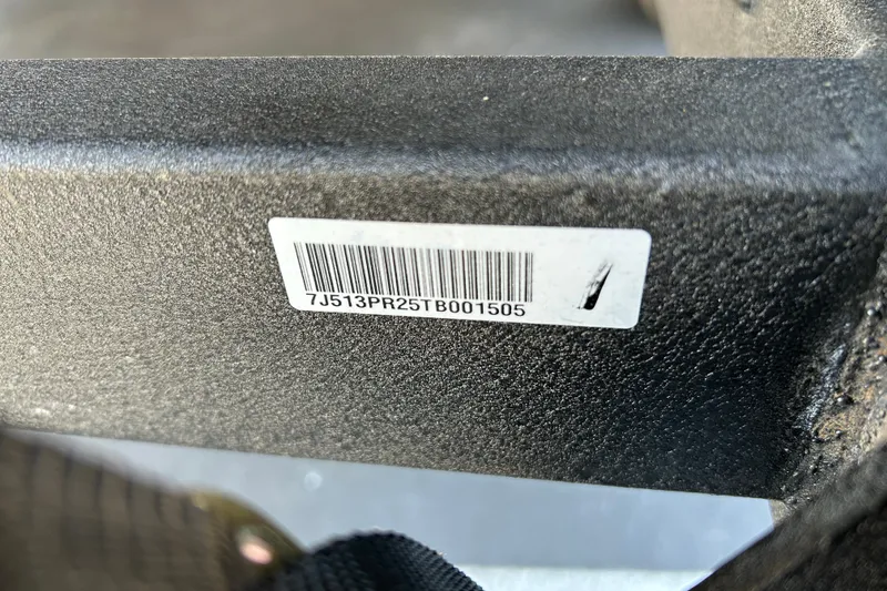 Slide: The Image of Barcode label on Sun Tracker Fishin' Barge 22 DLX, 2026 model. - 127