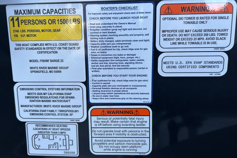 Slide: The Image of Safety and capacity labels on 2026 Sun Tracker Fishin' Barge 22 DLX boat. - 36