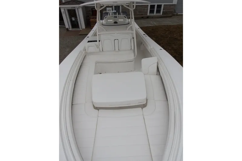 Slide: The Image of 2018 Regulator 34SS boat interior with white seating and helm station. - 31