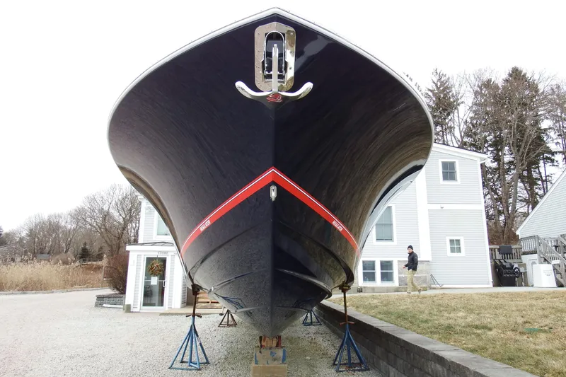 Slide: The Image of 2018 Regulator 34SS boat on stands, front view, near residential area. - 6