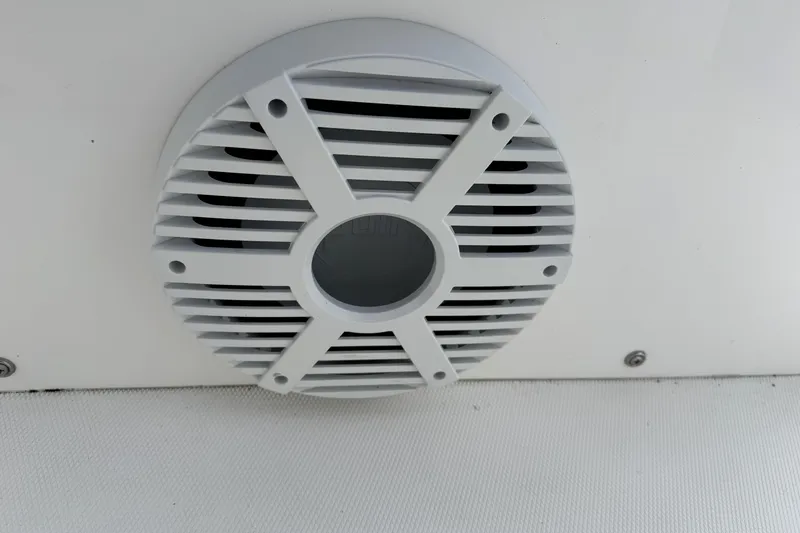 Slide: The Image of Close-up of a speaker grille on a 2018 Regulator 34SS boat. - 84