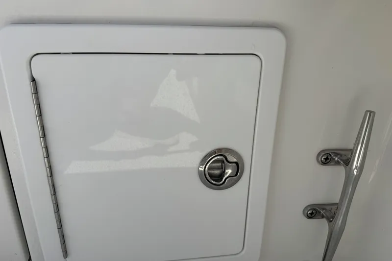 Slide: The Image of Hatch door and handle on 2018 Regulator 34SS boat. - 88