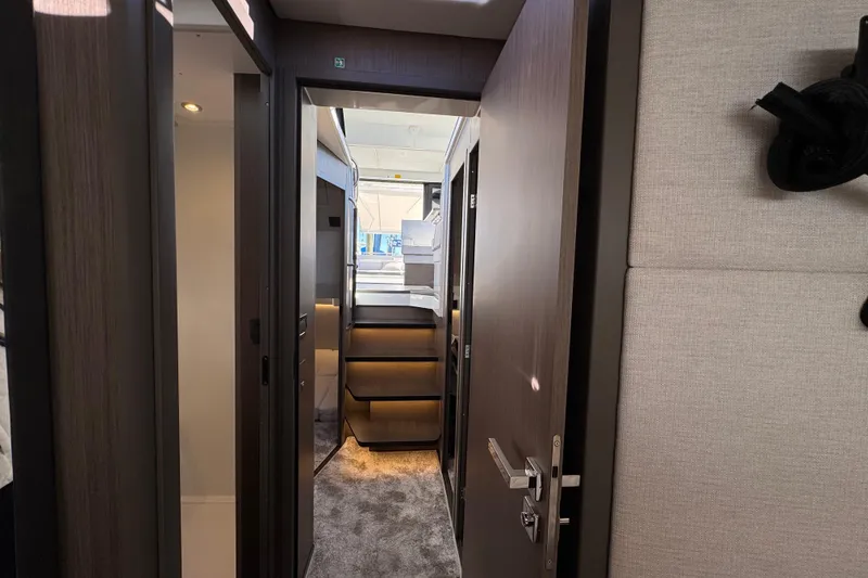 Slide: The Image of Interior view of 2026 Jeanneau NC 1295 Coupe yacht, featuring modern design and elegant finishes. - 19