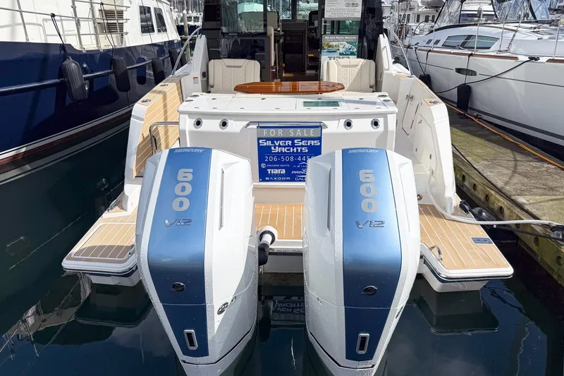 Slide: The Image of 2026 Tiara Yachts 43 LE with twin Mercury 600 V12 engines, docked and for sale. - 10