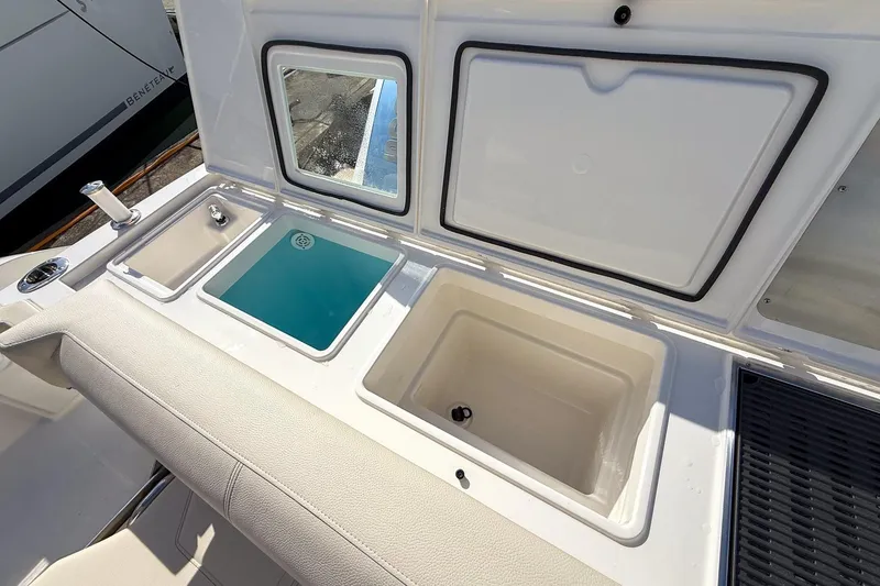 Slide: The Image of 2026 Tiara Yachts 43 LE boat interior with sink and storage compartments. - 28