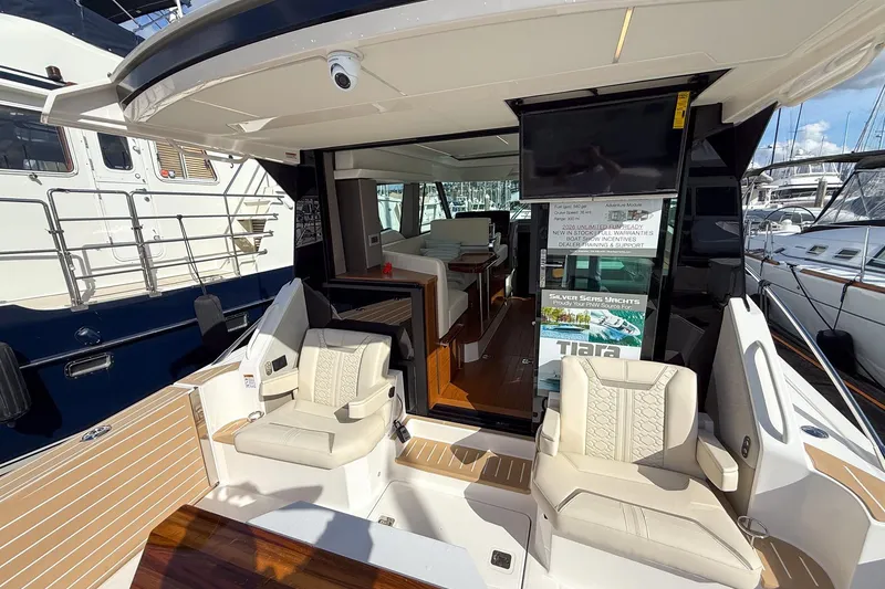 Slide: The Image of 2026 Tiara Yachts 43 LE luxury yacht interior with seating and modern amenities. - 32